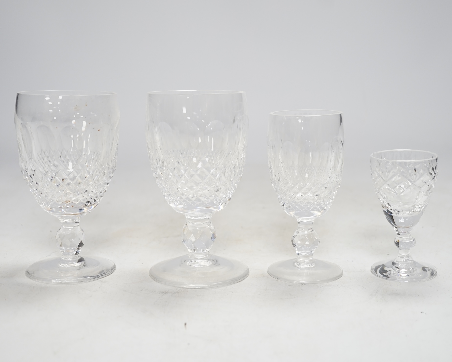 A small collection of Waterford crystal and other cut glass drinking glasses, highest 12cm, (18)
